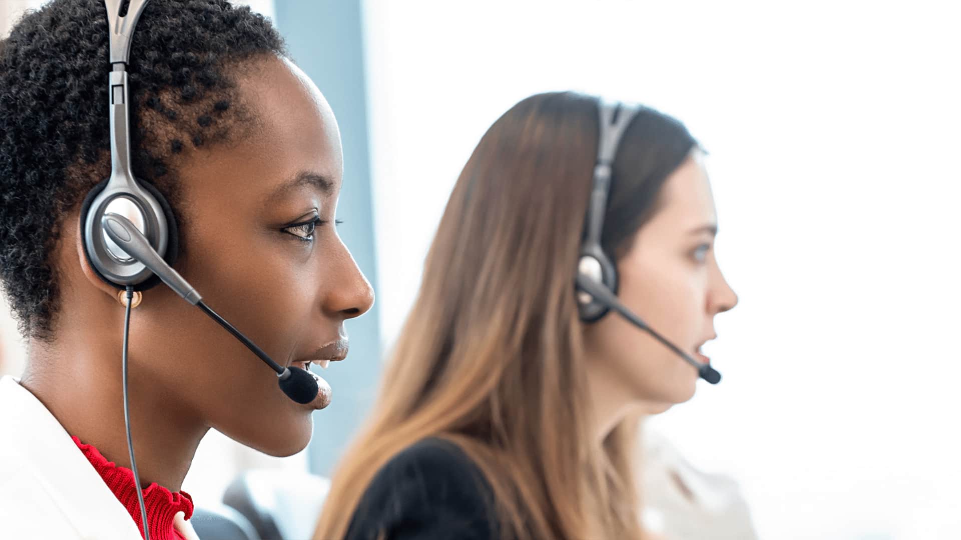 Telemarketers working with headsets